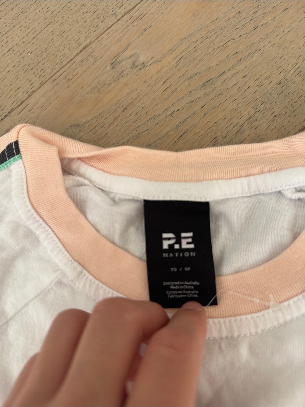 P.E Nation White Tee with Pink & Green Stripe Trim - Picture 2 of 3